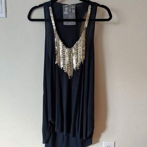 Dark blue tank with metallic embellishments